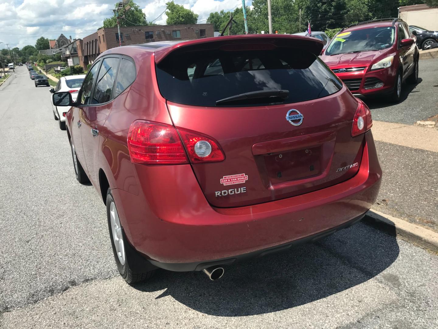 2010 Red /Gray Nissan Rogue S (JN8AS5MV0AW) with an 2.5 V4 engine, Automatic transmission, located at 577 Chester Pike, Prospect Park, PA, 19076, (610) 237-1015, 39.886154, -75.302338 - 2010 Nissan Rogue S: Only 124k miles, AWD, new PA inspection, great on gas, runs LIKE NEW! This vehicle comes inspected and has been given a bumper to bumper safety check. It is very clean, reliable, and well maintained. We offer a unique pay plan that is known for being the easiest and fastest f - Photo#5